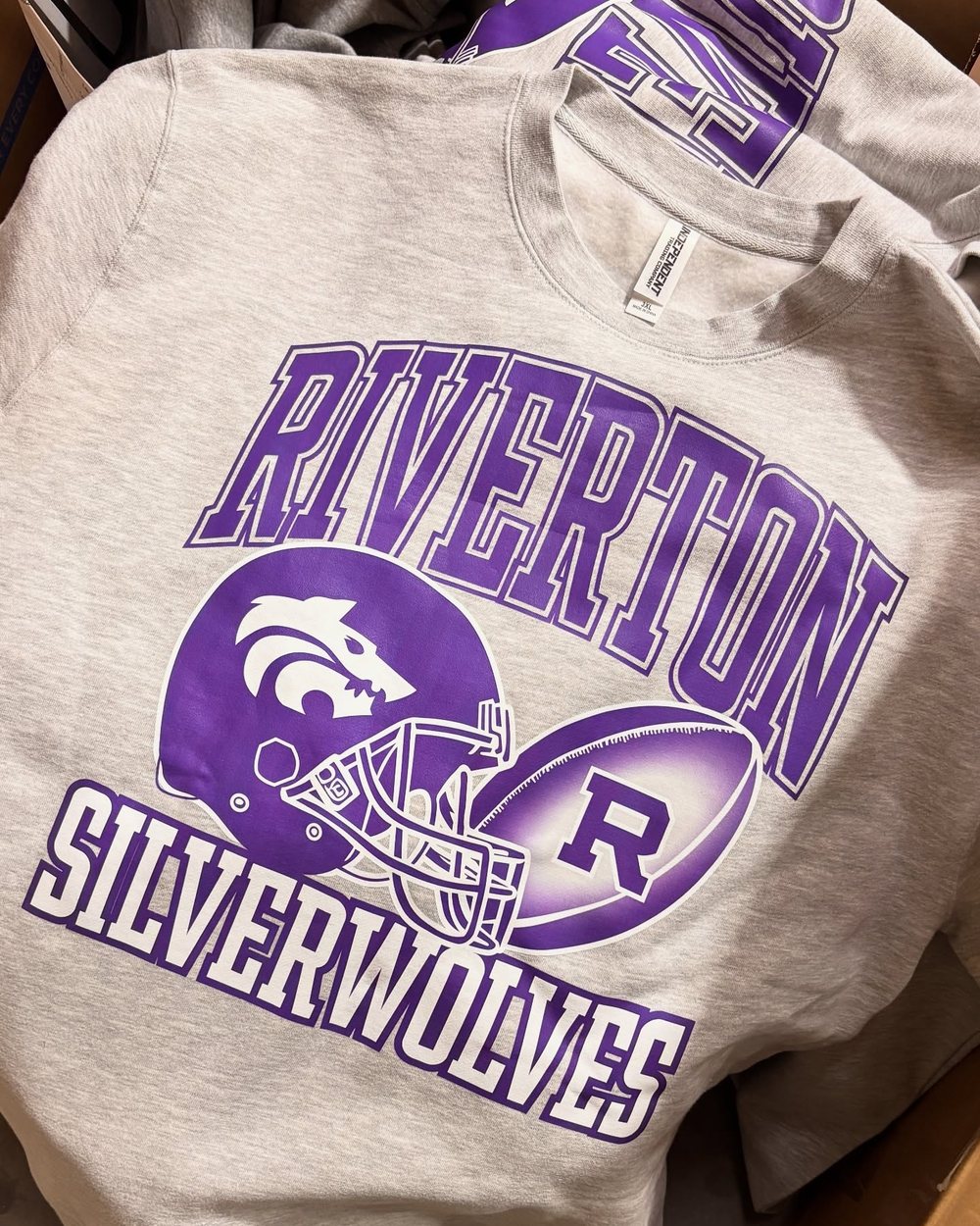 Custom-decorated custom hoodies produced by Lift Threadz Promos